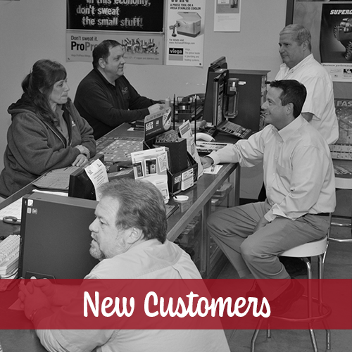 customers sitting/talking at sales counter